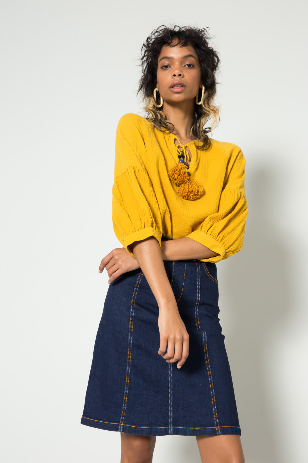 Mustard yellow corduroy skirt + navy polkadot blouse outfit. Fall outfit.